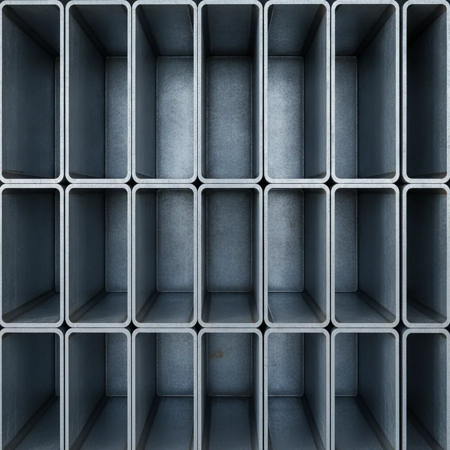 A pressed steel channel face, the bays repeating at a regular pitch