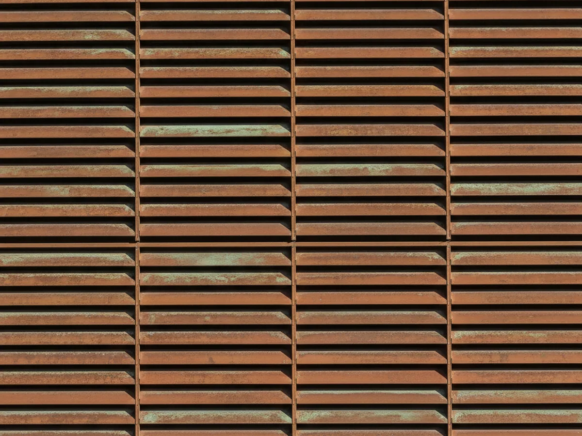 Copper-toned louvre fins in a repeating row